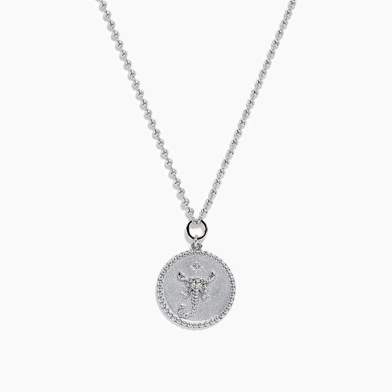 The Zodiac 925 Sterling Silver and Diamond Scorpio Necklace features a round, textured pendant with an engraved scorpion design, hanging from a beaded chain against a white background.