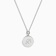 The Zodiac 925 Sterling Silver and Diamond Sagittarius Necklace features a round pendant with an engraved horse and rider, beaded edge design, and is perfect for Sagittarius lovers. Displayed on a white background.
