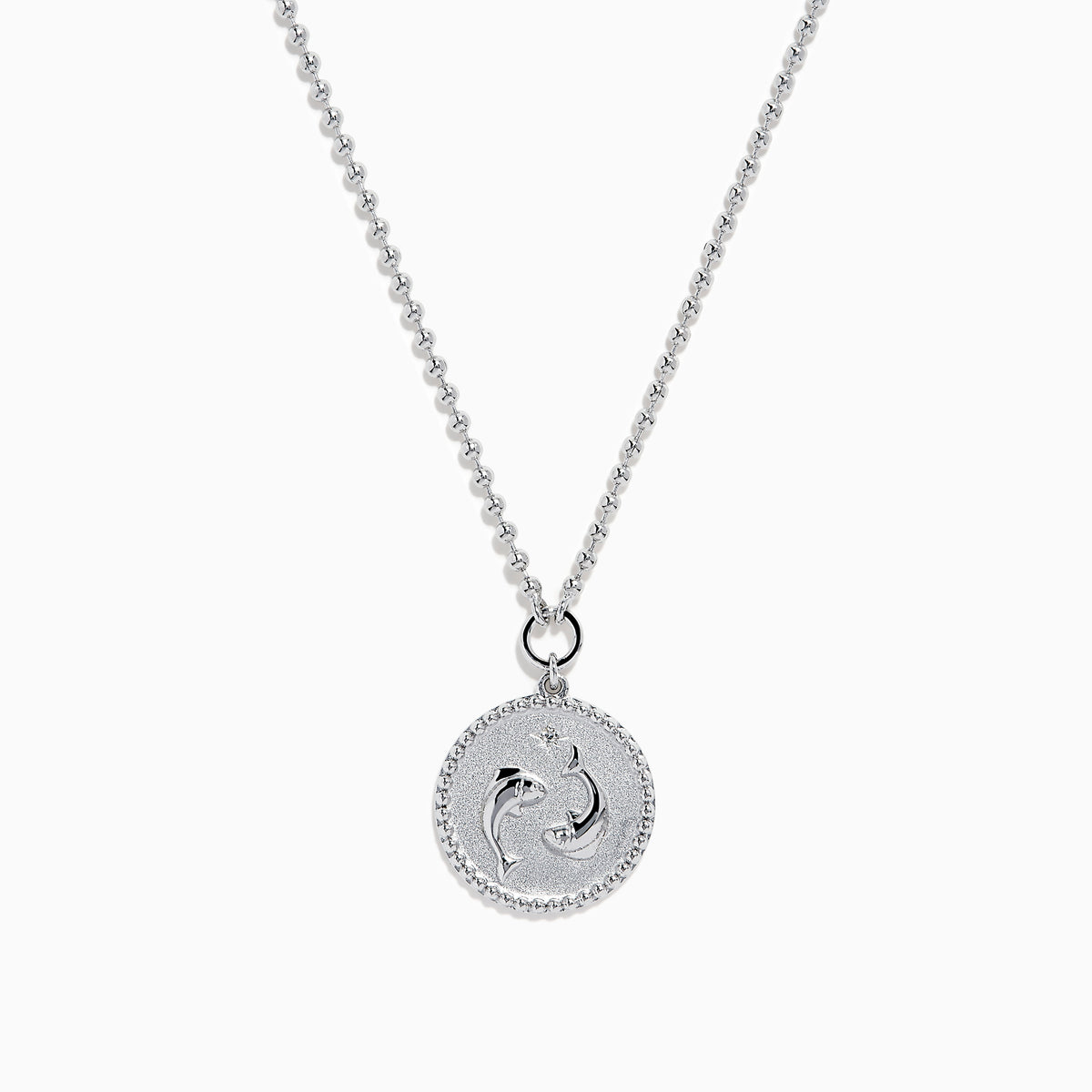 The Zodiac 925 Sterling Silver and Diamond Pisces Necklace features a beaded chain and a round pendant engraved with two dolphins, shown against a white background.