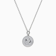 The Zodiac 925 Sterling Silver and Diamond Pisces Necklace features a beaded chain and a round pendant engraved with two dolphins, shown against a white background.