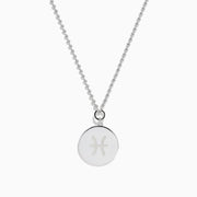 The Zodiac 925 Sterling Silver and Diamond Pisces Necklace features a beaded chain and a round pendant engraved with two dolphins, shown against a white background.