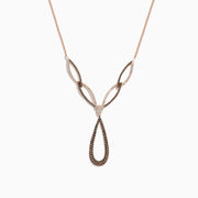 The 14K Rose Gold Brown and White Diamond Necklace features interlocking teardrop and marquise-shaped links set with sparkling brown and white diamonds for an elegant, intricate look.