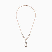 The 14K Rose Gold Brown and White Diamond Necklace features interlocking teardrop and marquise-shaped links set with sparkling brown and white diamonds for an elegant, intricate look.