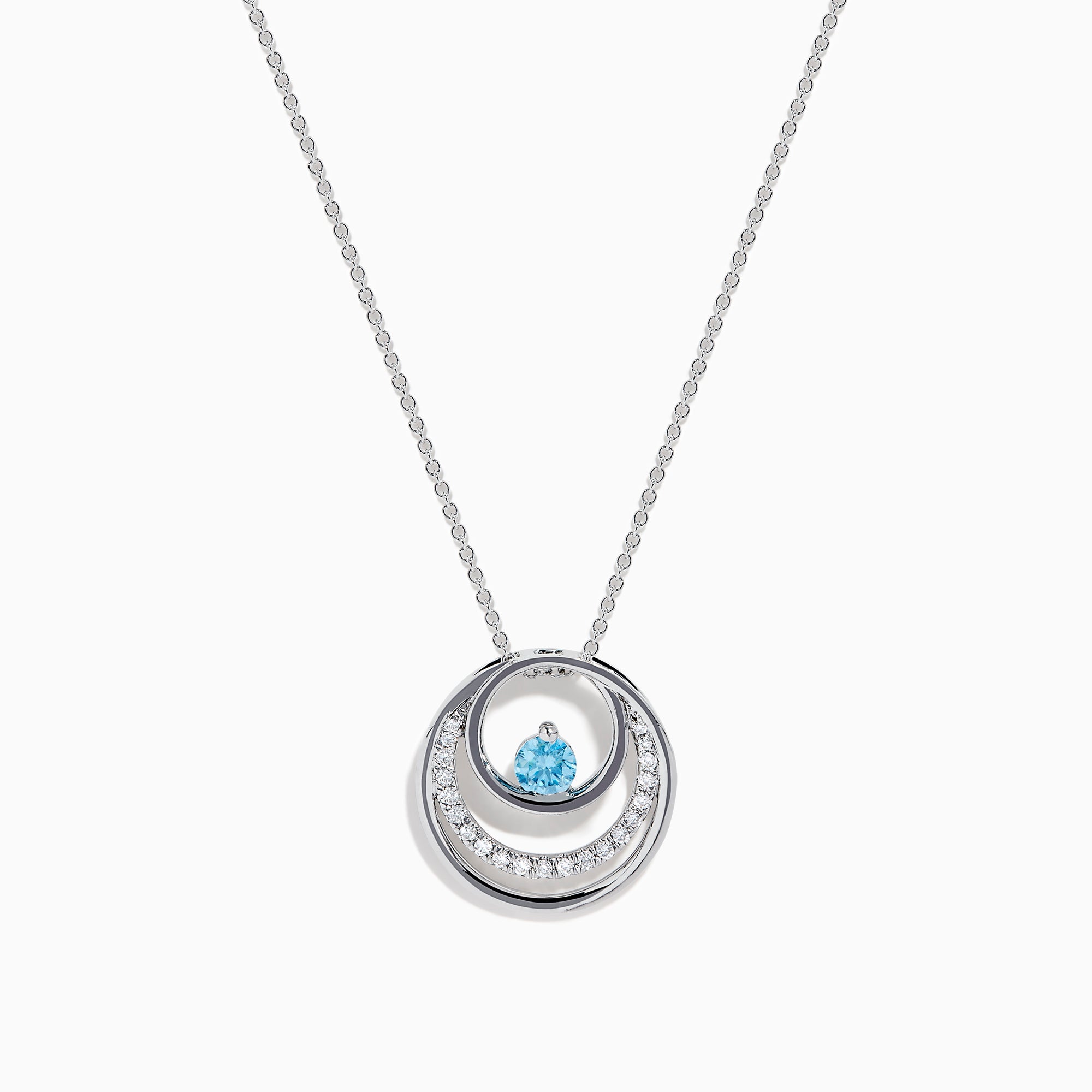 The Lab Grown Blue and White Diamond Circle Pendant in 14K White Gold features a circular pendant with clear and blue stones, displayed on a plain white background.