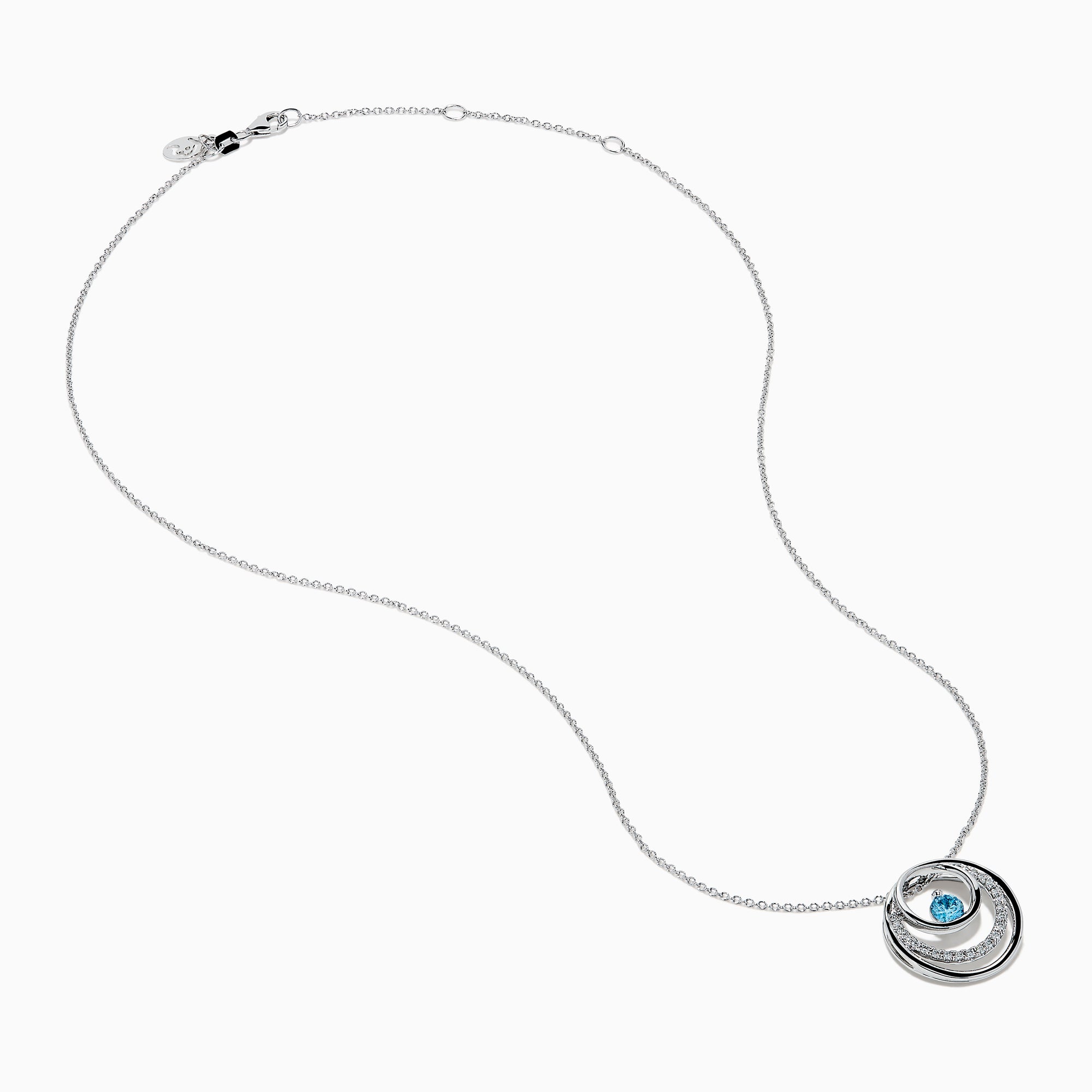 The Lab Grown Blue and White Diamond Circle Pendant in 14K White Gold features a circular pendant with clear and blue stones, displayed on a plain white background.
