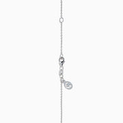The Lab Grown Blue and White Diamond Circle Pendant in 14K White Gold features a circular pendant with clear and blue stones, displayed on a plain white background.