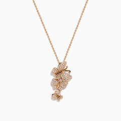 The Pave Rose 14K Rose Gold Diamond Multi Butterfly Pendant features a rose gold chain with a butterfly pendant adorned with sparkling white diamonds in a cascading design, set against a plain white background.