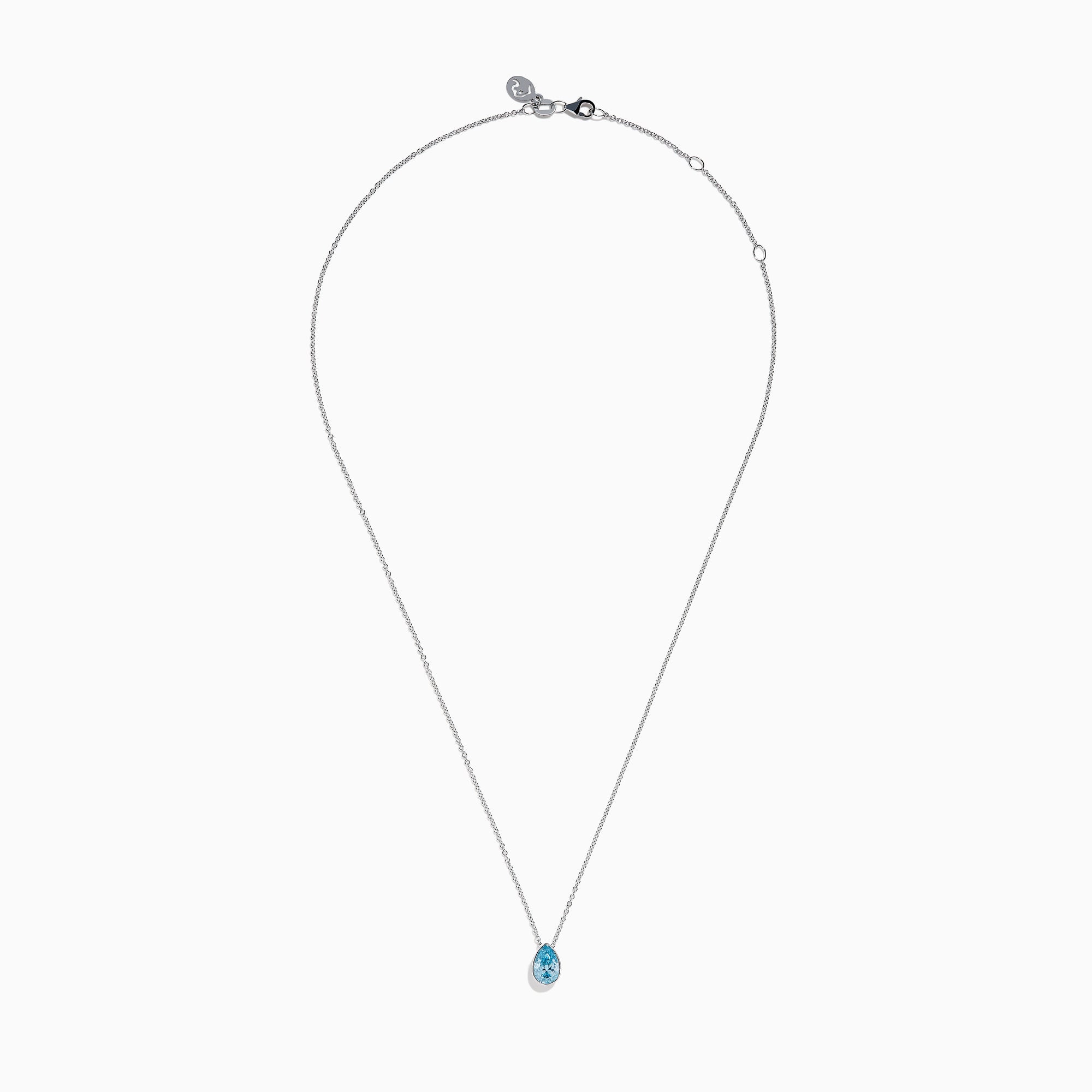 The Lab Grown Pear Solitaire Blue Diamond Collarbone Necklace in 14K White Gold features a minimalist bezel-set, teardrop-shaped blue diamond pendant on a fine white gold chain, elegantly displayed against a white background.
