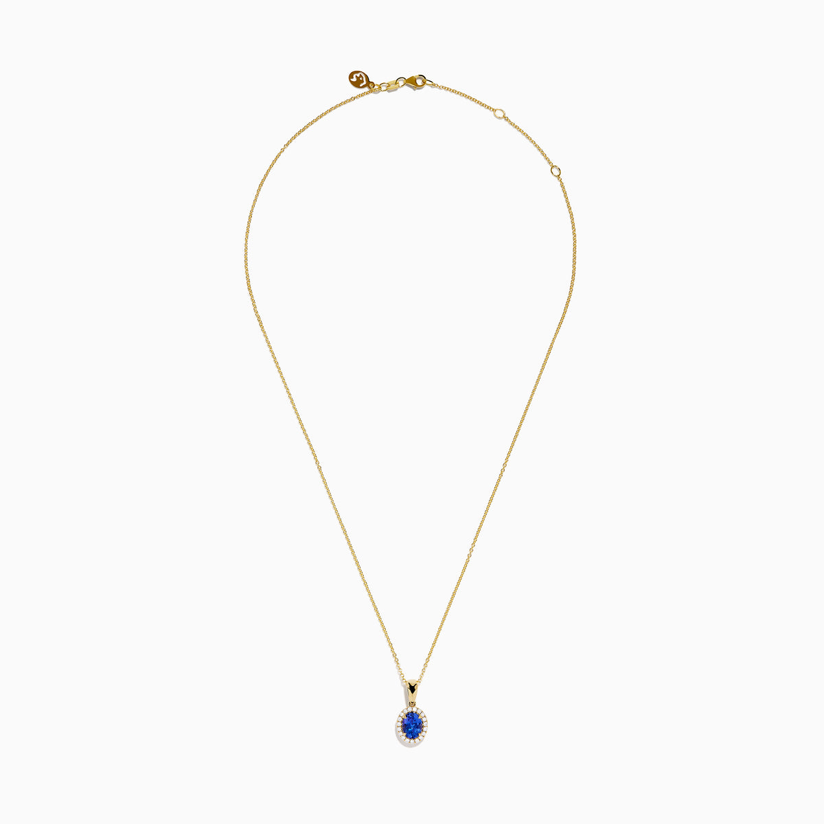 The Nahla 14K Yellow Gold Oval Tanzanite and Diamond Pendant features an oval tanzanite encircled by sparkling diamonds, displayed on a sleek yellow gold chain against a plain white background.