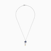 The Seaside 14K Two-Tone Gold Tanzanite and Diamond Starfish Pendant features a tanzanite gemstone, diamond accents, and elegant two-tone gold detailing in a charming starfish design.