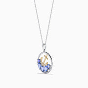 The Seaside 925 Sterling Silver & 14K Gold Tanzanite & Diamond Anchor Pendant features a round anchor pendant accented with dazzling diamonds and vibrant tanzanite gemstones, crafted in sterling silver and gold.