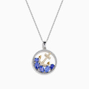The Seaside 925 Sterling Silver & 14K Gold Tanzanite & Diamond Anchor Pendant features a round anchor pendant accented with dazzling diamonds and vibrant tanzanite gemstones, crafted in sterling silver and gold.