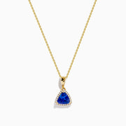The Nahla Siri 14K Yellow Gold Tanzanite and Diamond Pendant features a triangular tanzanite accented by sparkling diamonds, set on a delicate gold chain against a white background.