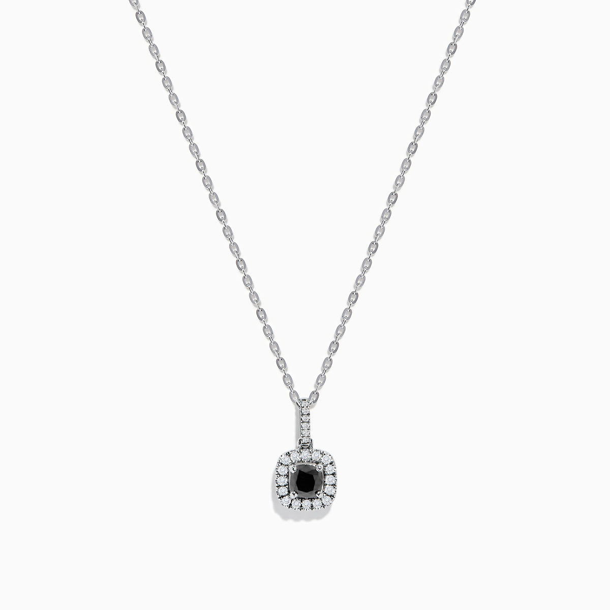 The 14K White Gold Black and White Diamond Halo Pendant features a central black diamond encircled by a halo of white diamonds, shown against a plain white background.