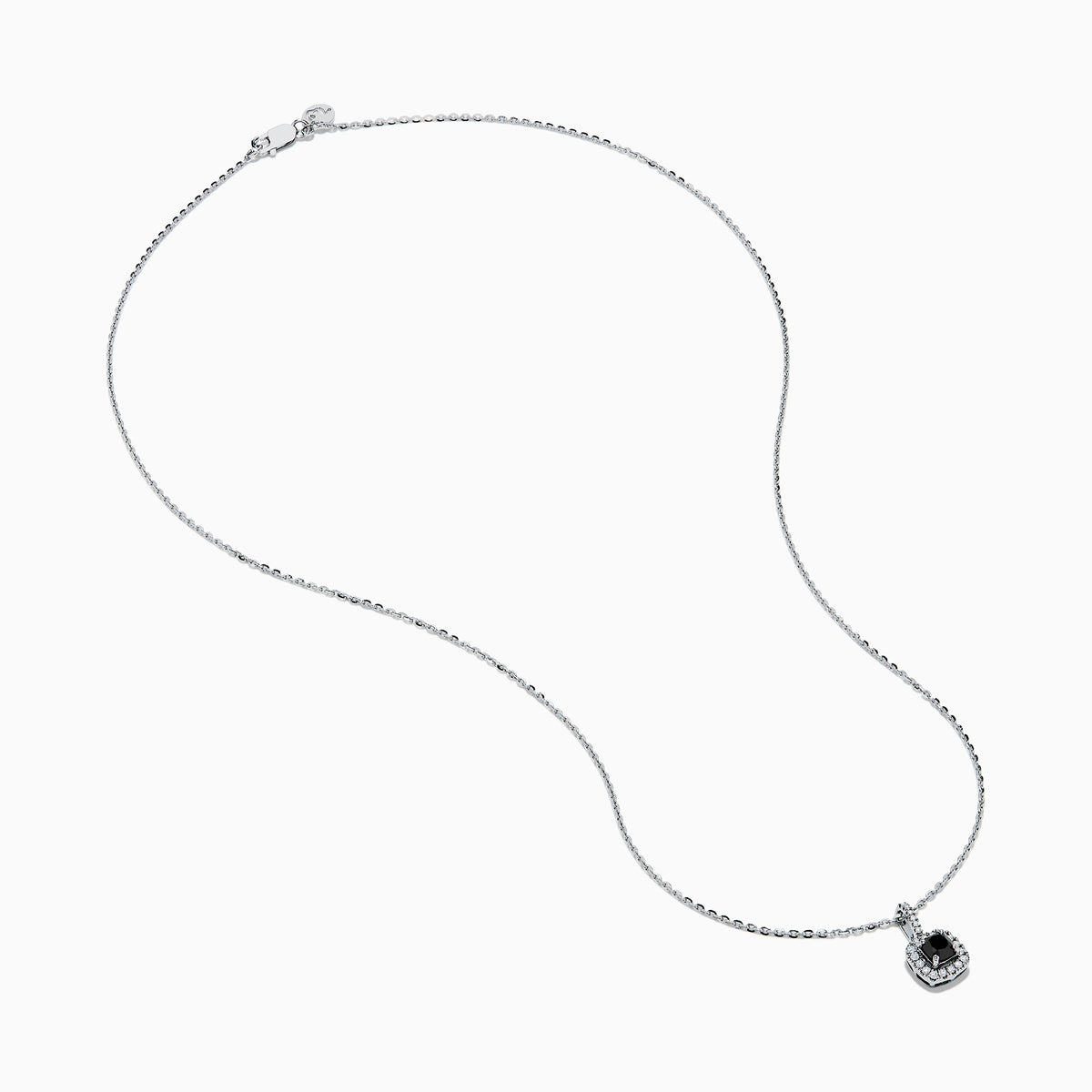 The 14K White Gold Black and White Diamond Halo Pendant features a central black diamond encircled by a halo of white diamonds, shown against a plain white background.