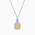 The 14K Two Tone Gold White and Yellow Diamond Cluster Pendant features a square of yellow gemstones framed by white gemstones on a delicate chain.