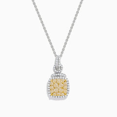 The 14K Two Tone Gold White and Yellow Diamond Cluster Pendant features a square of yellow gemstones framed by white gemstones on a delicate chain.