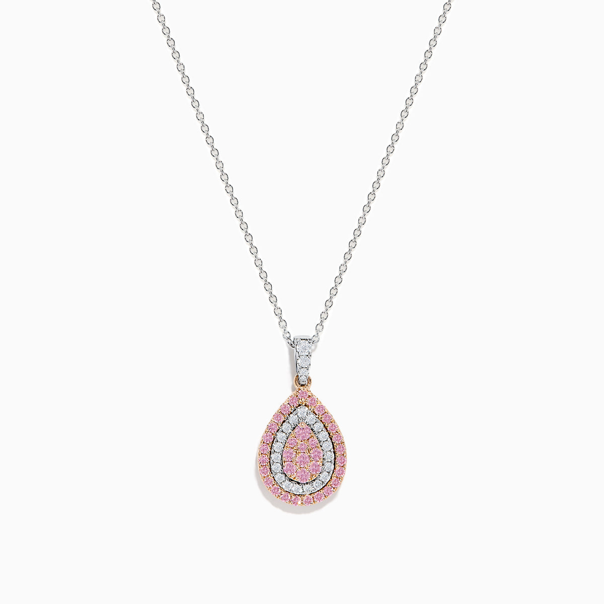 The 14K Two Tone Gold Pink and White Diamond Pendant features a teardrop design with concentric pink and white diamonds, accented by three white stones linking the pendant to the chain.