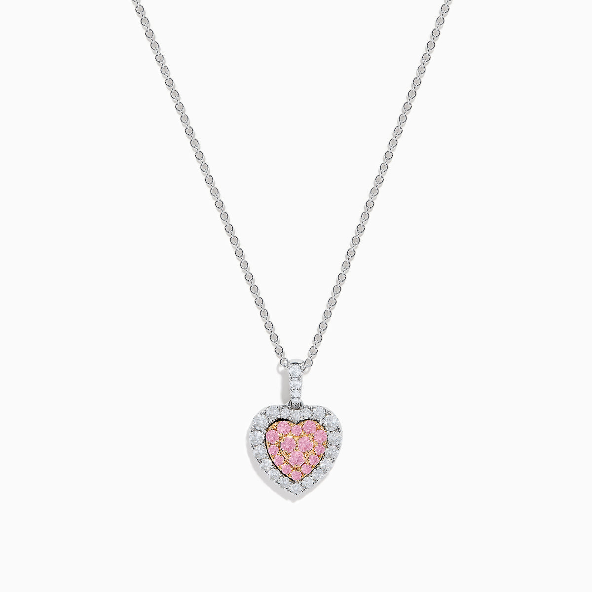 The 18K Two Tone Gold Pink and White Diamond Heart Pendant features sparkling pink center stones bordered by clear diamonds, creating a dazzling accessory perfect for any occasion.
