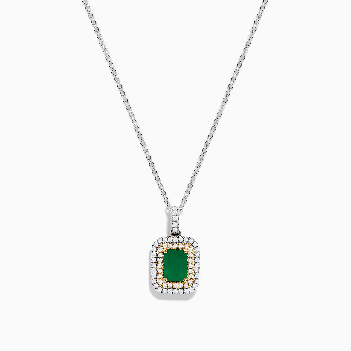 The Brasilica 14K White & Yellow Gold Emerald and Diamond Pendant features a silver chain, a rectangular emerald framed by two rows of white diamonds, and 14K white and yellow gold accents around the stone.
