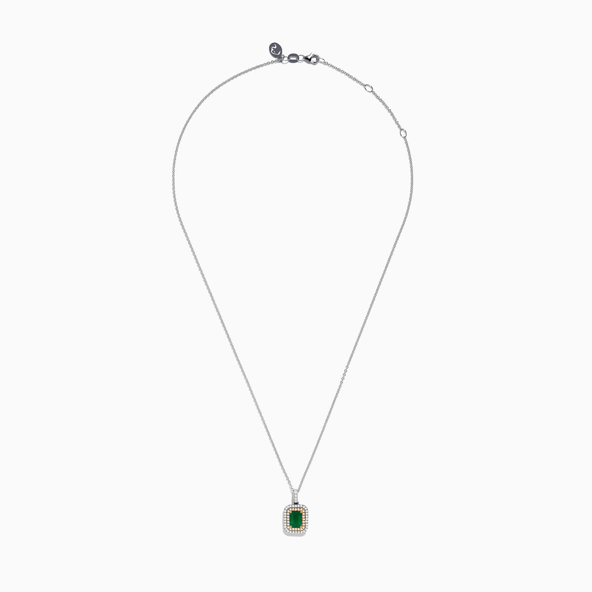The Brasilica 14K White & Yellow Gold Emerald and Diamond Pendant features a silver chain, a rectangular emerald framed by two rows of white diamonds, and 14K white and yellow gold accents around the stone.