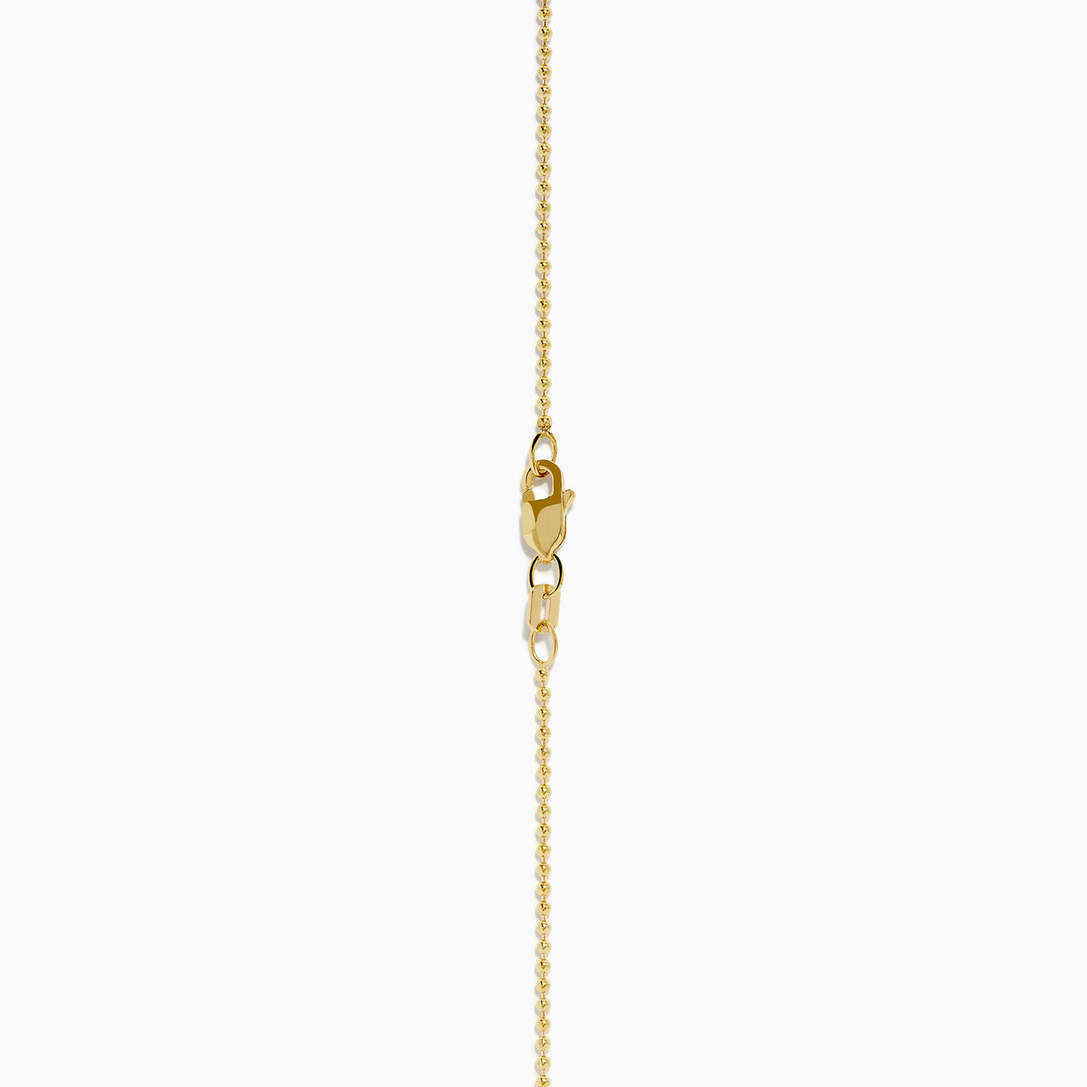 The 14K Yellow Gold Black Diamond Cross Pendant features an octagonal black diamond cross set in 14K yellow gold, shown against a white background.