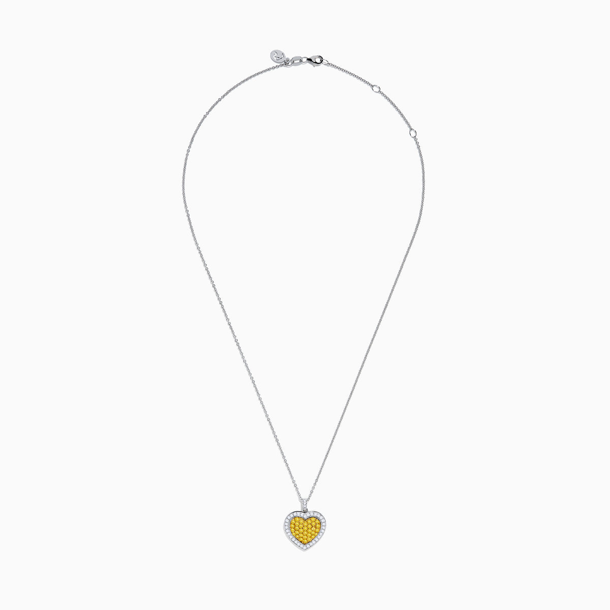 The 18K Two Tone Gold White and Yellow Diamond Heart Cluster Pendant features a heart shape bordered with white diamonds and a center of yellow diamonds, creating a vibrant, elegant design.