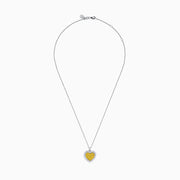 The 18K Two Tone Gold White and Yellow Diamond Heart Cluster Pendant features a heart shape bordered with white diamonds and a center of yellow diamonds, creating a vibrant, elegant design.