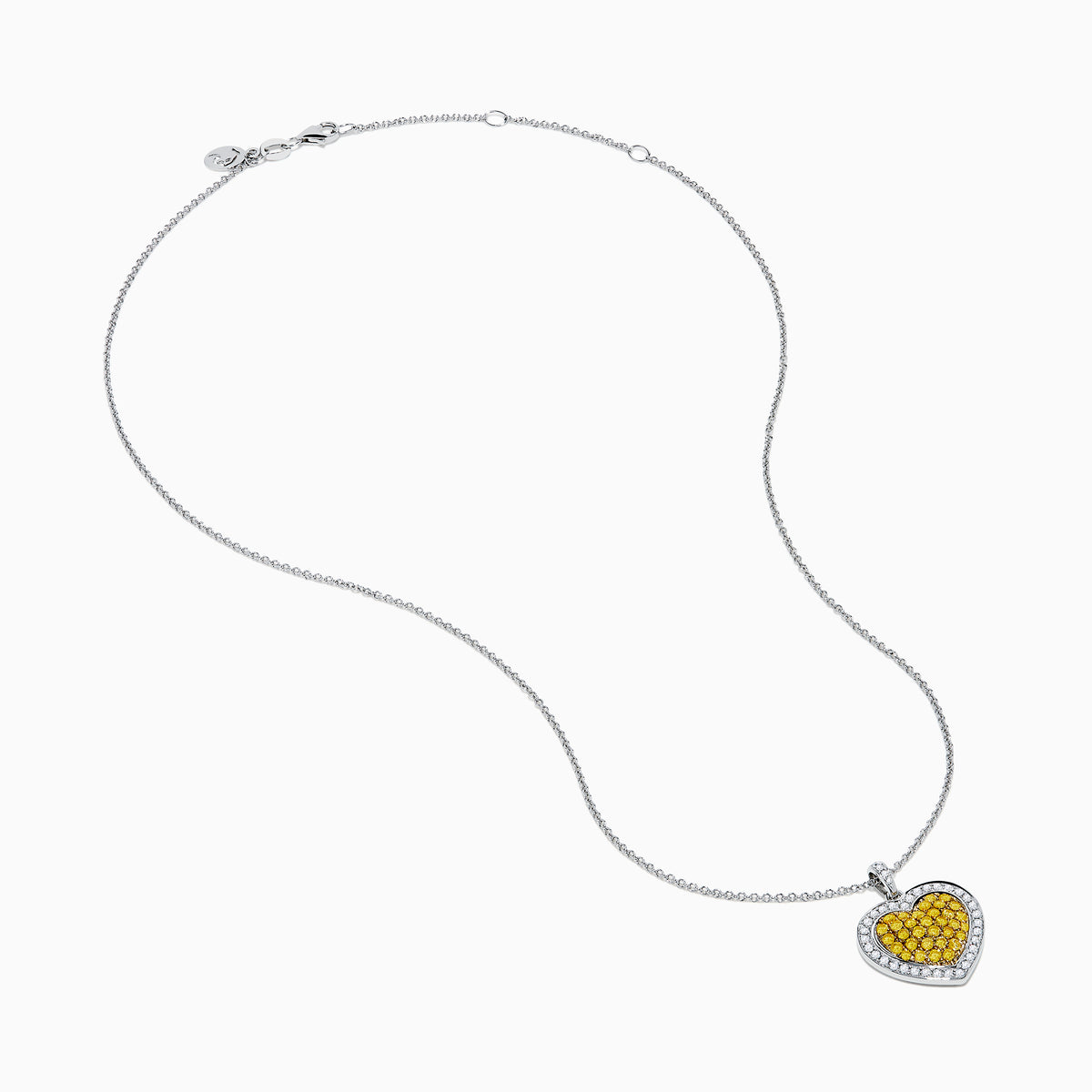 The 18K Two Tone Gold White and Yellow Diamond Heart Cluster Pendant features a heart shape bordered with white diamonds and a center of yellow diamonds, creating a vibrant, elegant design.