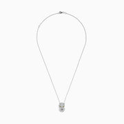 The Signature 14K White Gold Diamond and Emerald Panther Pendant features a panther head encrusted with diamond-like gems, yellow gemstone eyes, and a ring in its mouth, hanging from a delicate white gold chain.