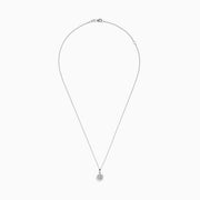 The Pave Classica 14K White Gold Diamond Halo Pendant (0.49 TCW) features a round center diamond with a sparkling halo, suspended from a delicate white gold chain. Displayed on a plain background, this piece reflects timeless elegance.