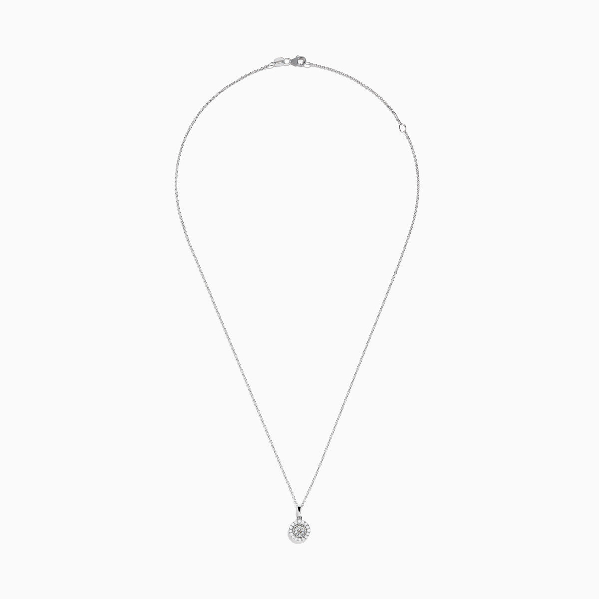 The Pave Classica 14K White Gold Diamond Halo Pendant (0.49 TCW) features a round center diamond with a sparkling halo, suspended from a delicate white gold chain. Displayed on a plain background, this piece reflects timeless elegance.
