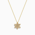 The Doro 14K Yellow Gold Diamond Star of David Pendant features a geometric design with sparkling diamonds along its lines, shown against a white background for an elegant and timeless look.