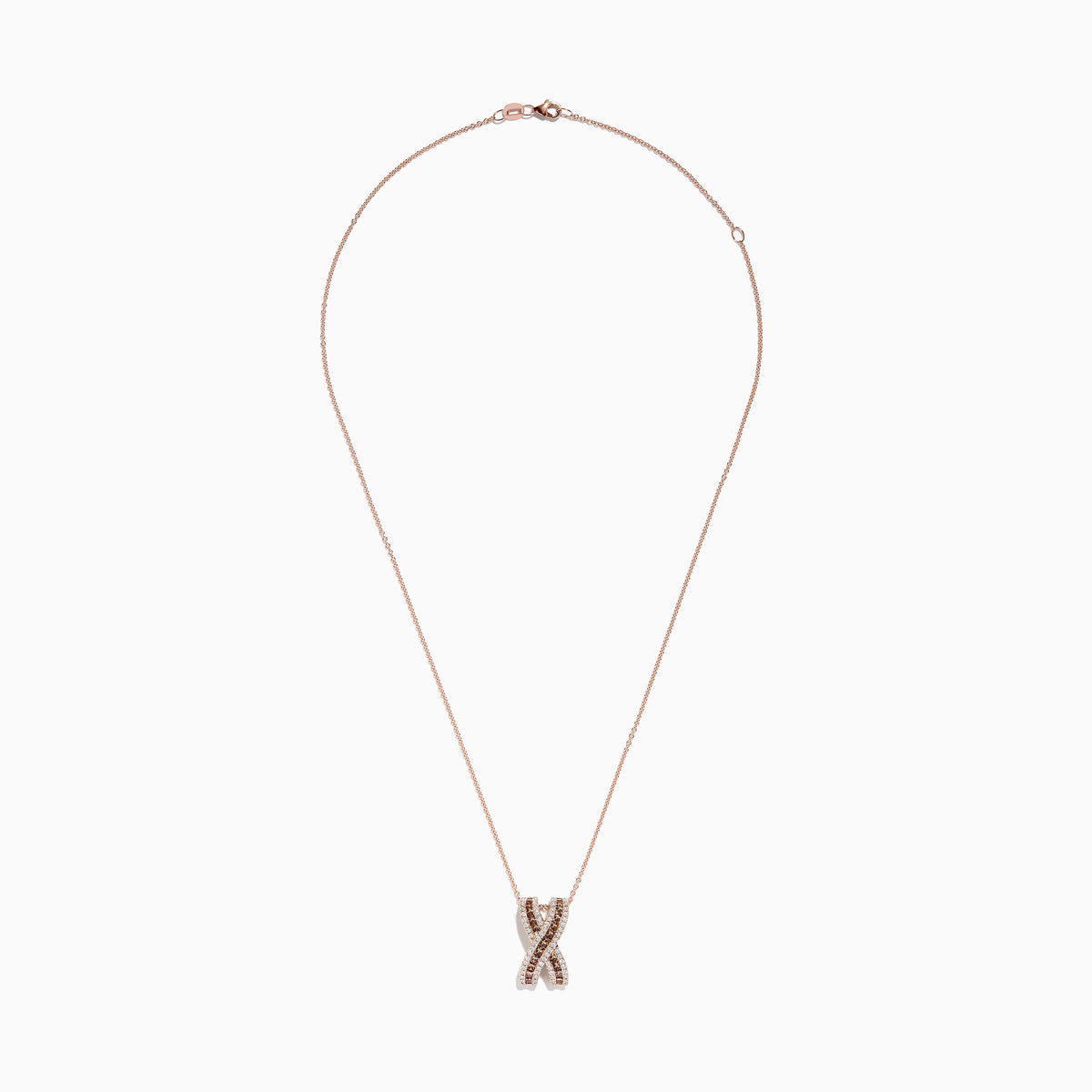 The 14K Rose Gold Brown and White Diamond Pendant features an “X”-shaped design with intertwined rows of brown and white diamonds, suspended from a delicate chain.