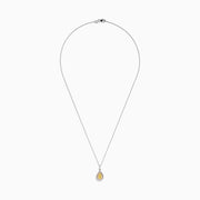An 18K three tone gold necklace with a pear-shaped yellow diamond pendant, accented by a pink diamond halo.