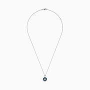 The Bella Bleu 14K White Gold Blue and White Diamond Flower Pendant features a circular floral design with a center cluster of white stones surrounded by sparkling blue and white diamonds.