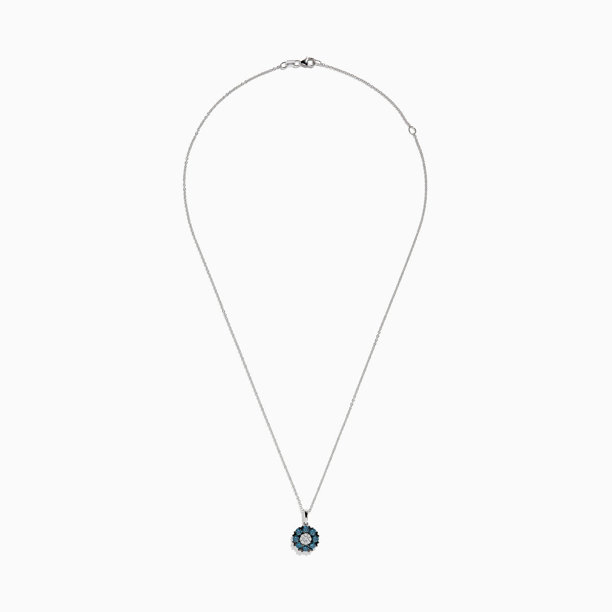 The Bella Bleu 14K White Gold Blue and White Diamond Flower Pendant features a circular floral design with a center cluster of white stones surrounded by sparkling blue and white diamonds.