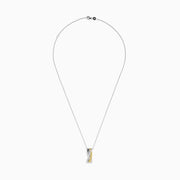 A delicate silver chain showcases the Canare 14K Two-Tone Gold Yellow and White Diamond Pendant, featuring two intertwined bands—one with yellow and white diamonds—set against a plain white background.