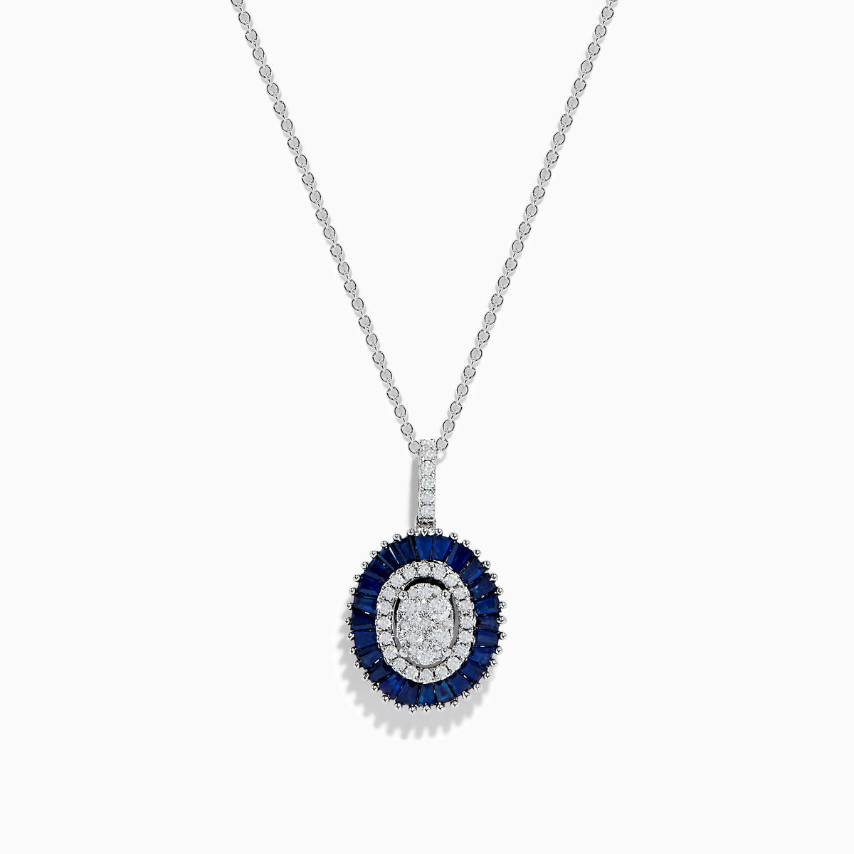 The Royal Bleu 14K White Gold Sapphire and Diamond Pendant features an oval diamond cluster surrounded by sapphires and an outer row of sparkling diamonds.
