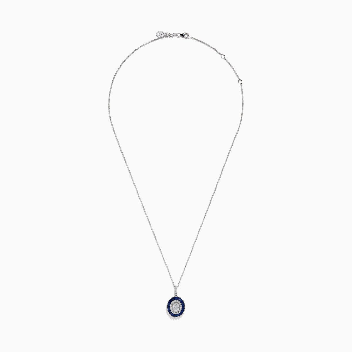 The Royal Bleu 14K White Gold Sapphire and Diamond Pendant features an oval diamond cluster surrounded by sapphires and an outer row of sparkling diamonds.