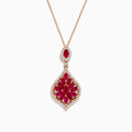 The Ruby Royale 14K Rose Gold Ruby and Diamond Pendant features red marquise-cut rubies in a floral design, bordered by sparkling diamonds, and hangs from a delicate rose gold chain.