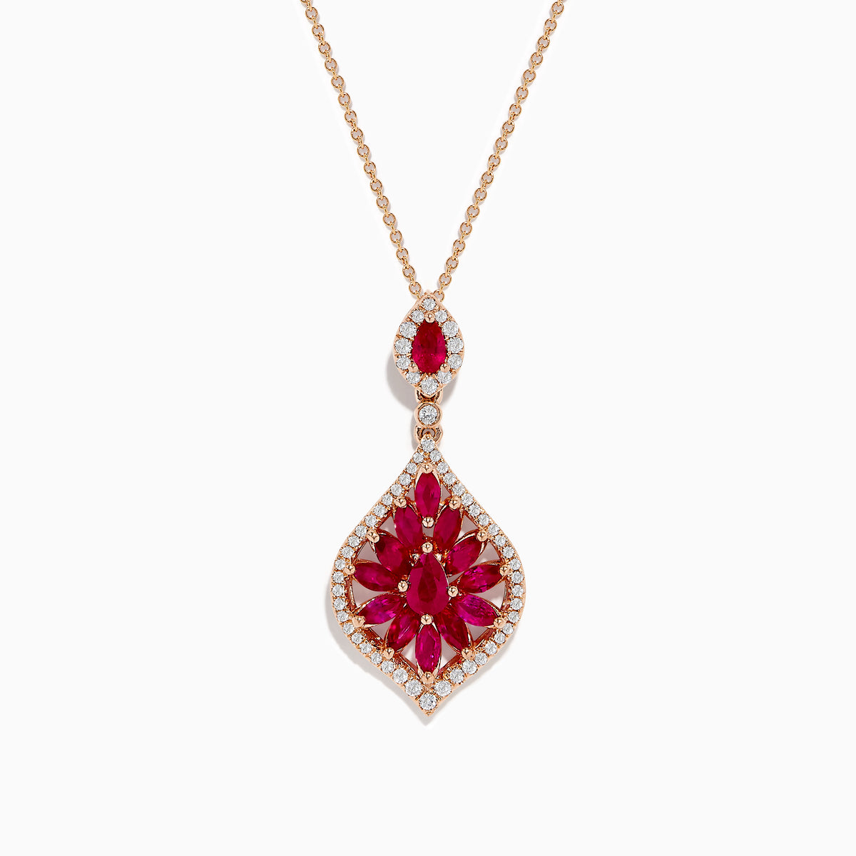 The Ruby Royale 14K Rose Gold Ruby and Diamond Pendant features red marquise-cut rubies in a floral design, bordered by sparkling diamonds, and hangs from a delicate rose gold chain.
