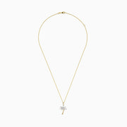 The 14K Yellow Gold Diamond Palm Tree Pendant features a delicate chain and sparkling white stones, combining gold and silver tones for an elegant, eye-catching look.