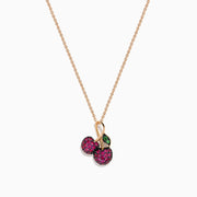 The 14K Rose Gold Ruby and Tsavorite Pavé Double Cherries Pendant features two round ruby pavé cherries and a sparkling tsavorite leaf accent on a delicate rose gold necklace.