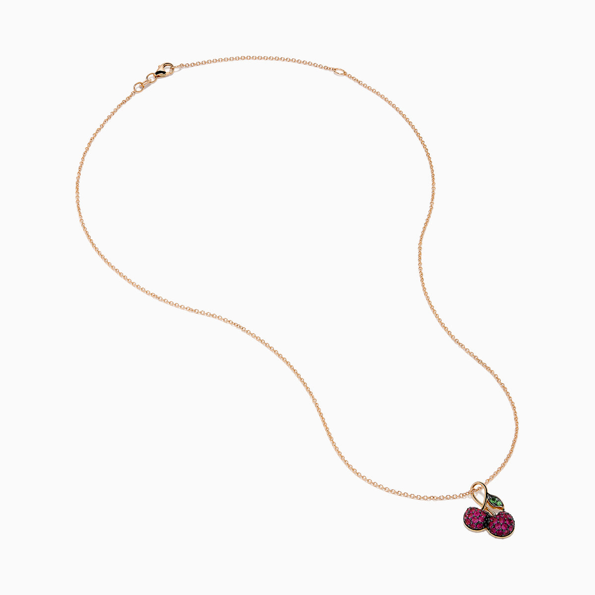 The 14K Rose Gold Ruby and Tsavorite Pavé Double Cherries Pendant features two round ruby pavé cherries and a sparkling tsavorite leaf accent on a delicate rose gold necklace.