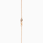 The 14K Rose Gold Ruby and Tsavorite Pavé Double Cherries Pendant features two round ruby pavé cherries and a sparkling tsavorite leaf accent on a delicate rose gold necklace.