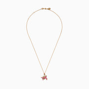 This 14K rose gold turtle pendant features pink and yellow sapphires, tsavorite, and sparkling diamonds for a dazzling look.