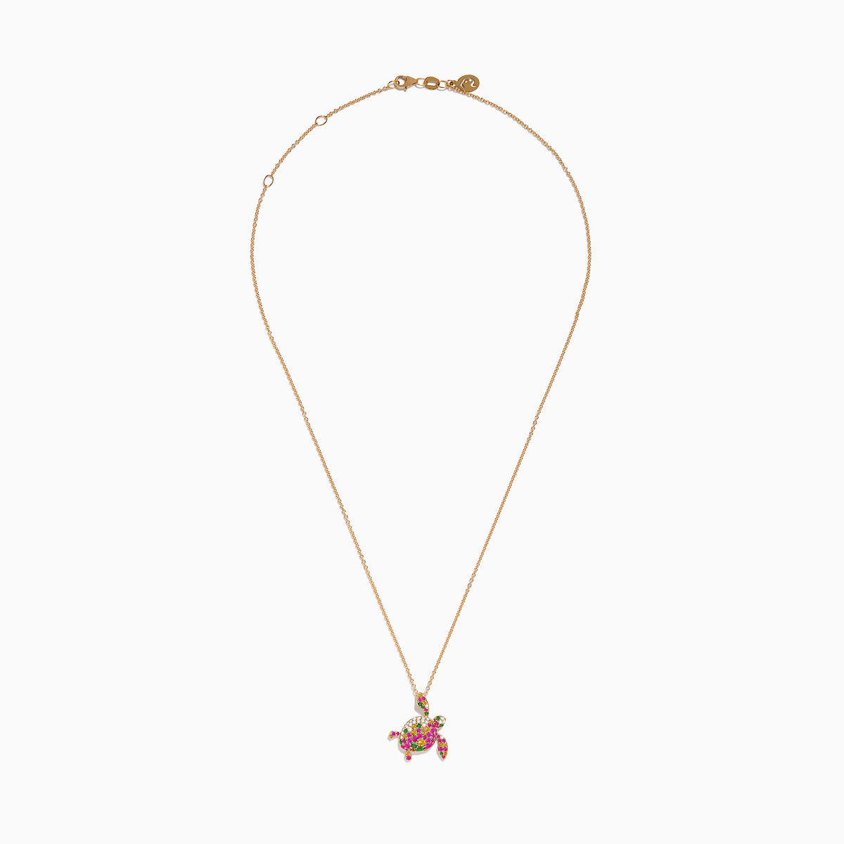 This 14K rose gold turtle pendant features pink and yellow sapphires, tsavorite, and sparkling diamonds for a dazzling look.