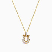 The DOro 14K Yellow Gold Diamond Horseshoe Pendant features a delicate yellow gold chain with a horseshoe pendant adorned with small, clear baguette-cut diamonds and elegant gold accents.