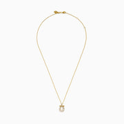 The DOro 14K Yellow Gold Diamond Horseshoe Pendant features a delicate yellow gold chain with a horseshoe pendant adorned with small, clear baguette-cut diamonds and elegant gold accents.